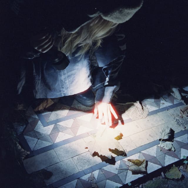 Album cover art for Spell