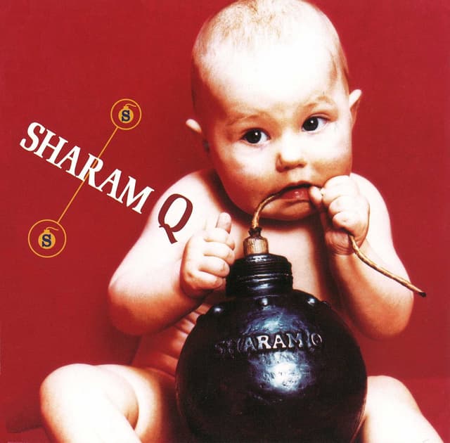 Album cover art for シャ乱Q ベストアルバム おまけつき’96〜’99
