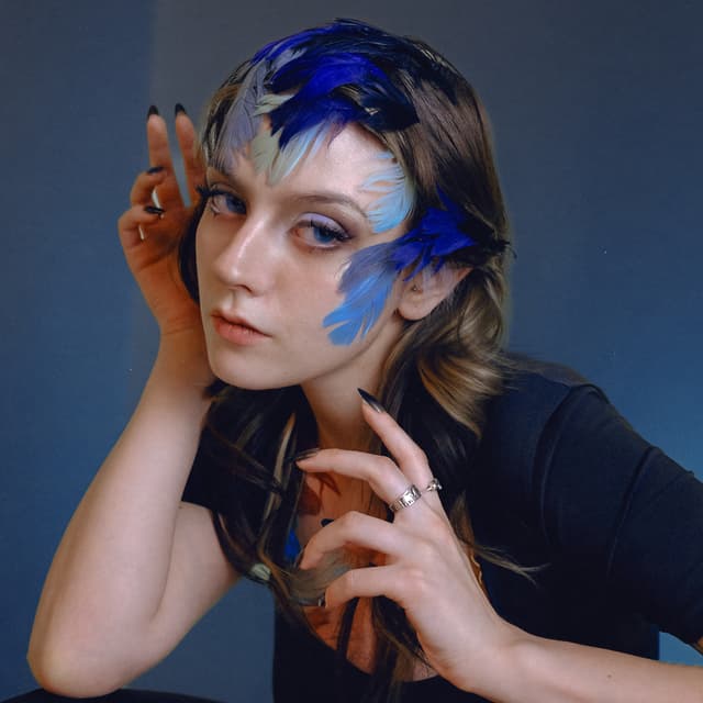 Album cover art for Пташка