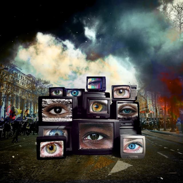 Album cover art for The World is Watching