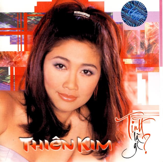 Album cover art for Tình là gì?