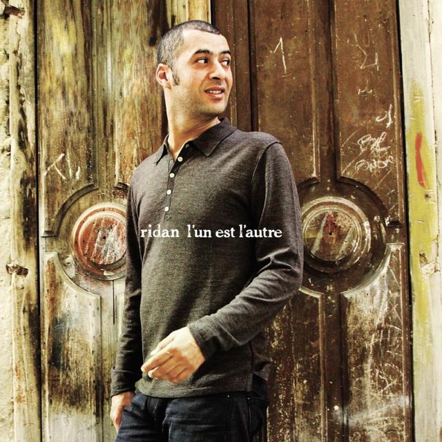 Album cover art for L'Un Est L'Autre