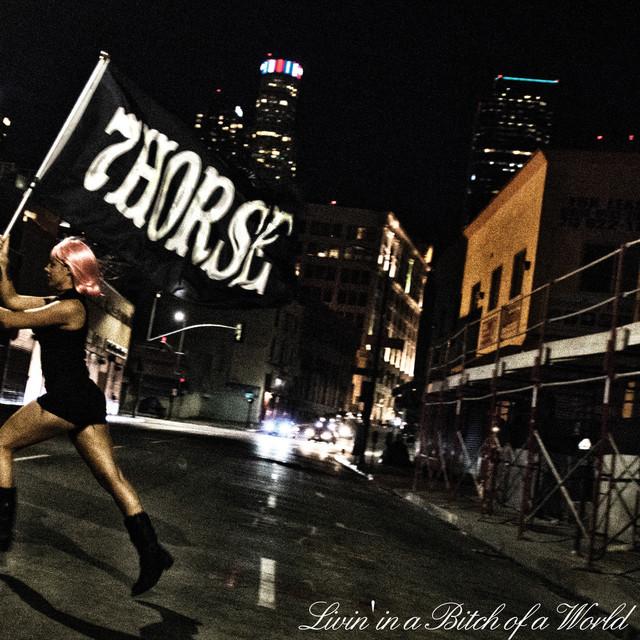 Album cover art for Livin in a Bitch of a World